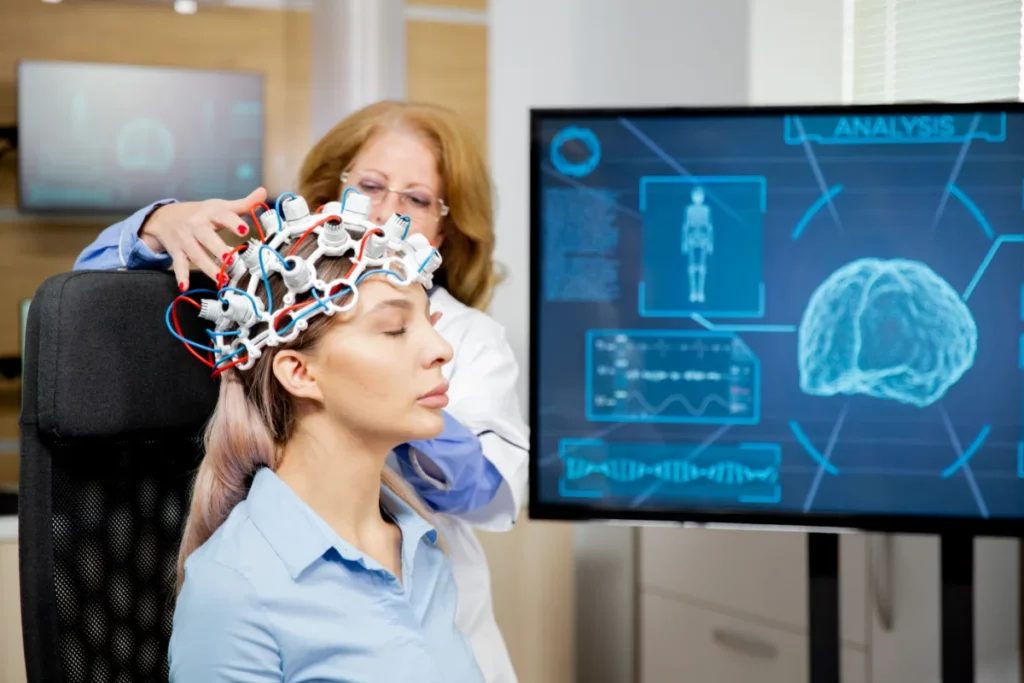 doctor arranging-scanning device head female patient