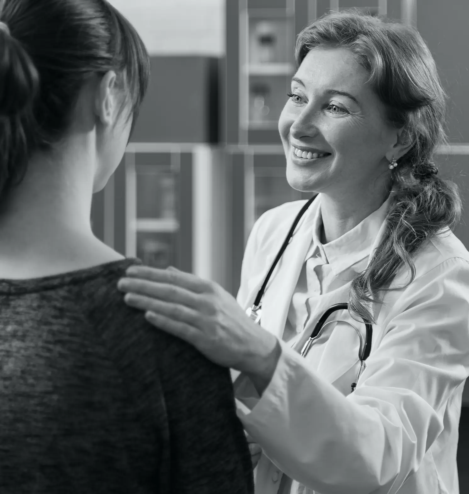 Doctor Consulting Patient Smiles