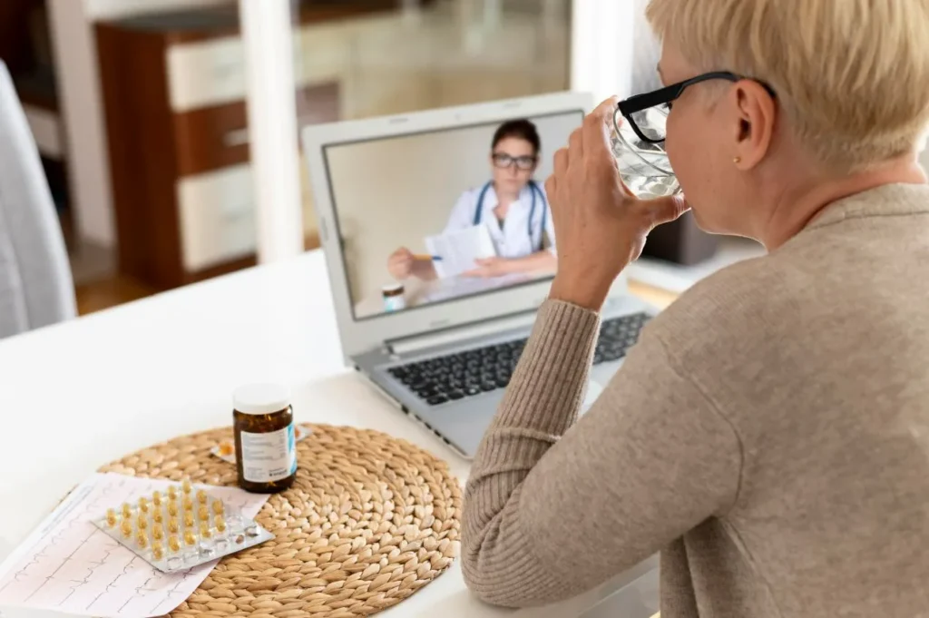 senior woman talking online doctor