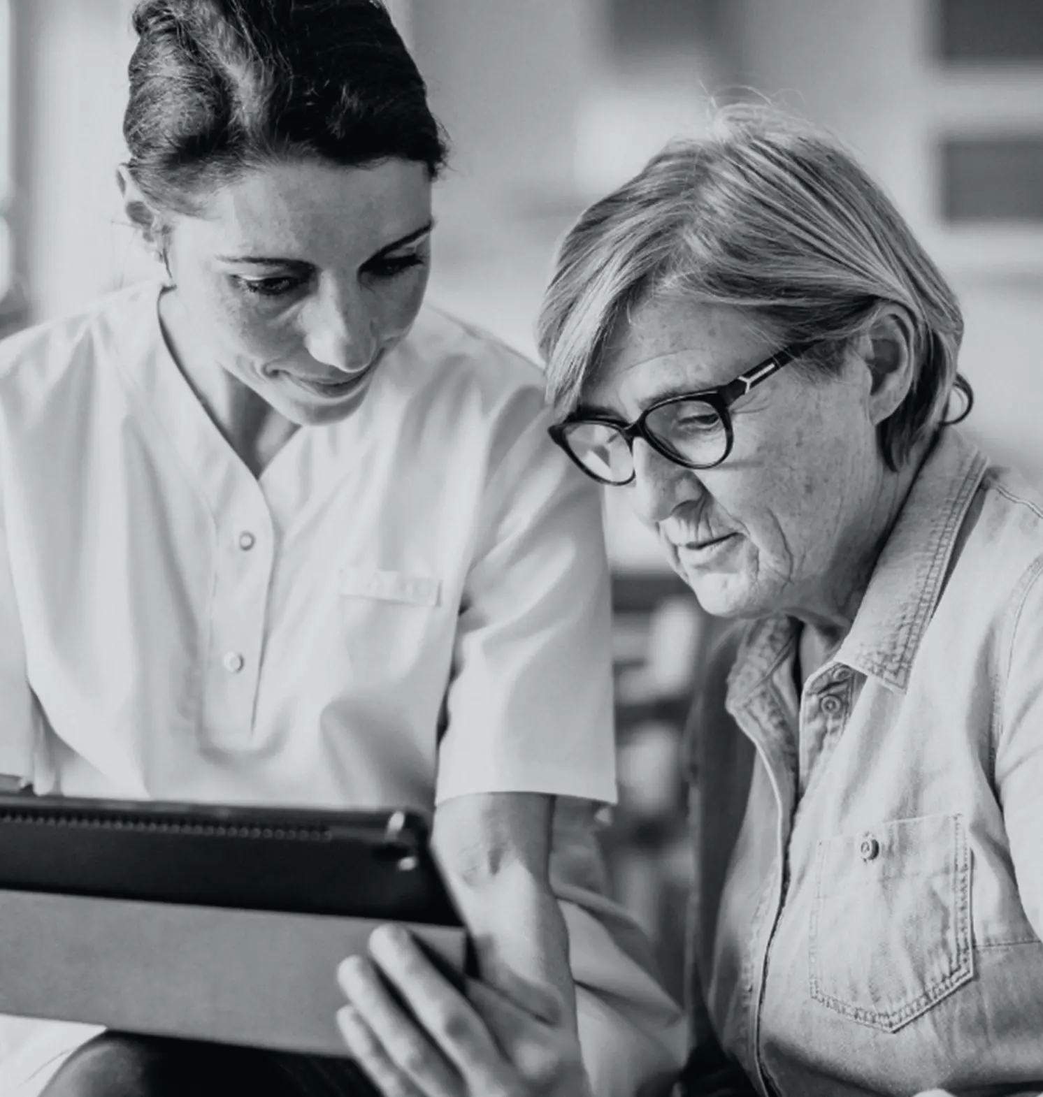 Doctor showing patient her charts
