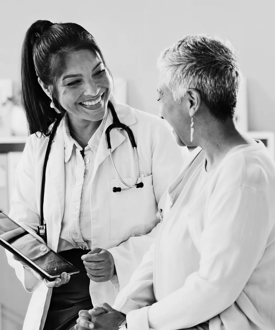 Female doctor smiling with patient